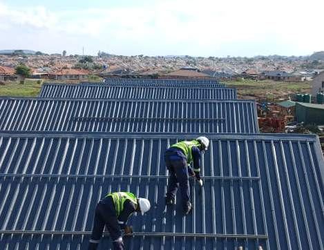 Installation team on roof